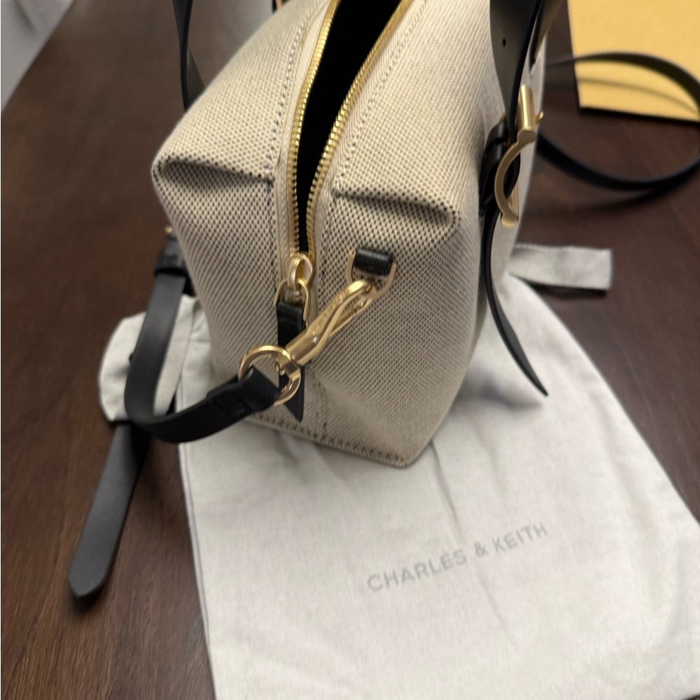 Charles & Keith Elegant Black and Cream canvas Satchel with shoulder strap - Picture 6 of 8